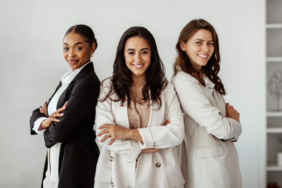 Women with all hands in
